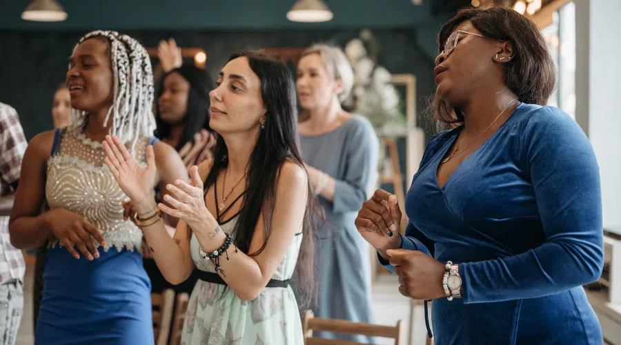 A group of women in a prayer group.