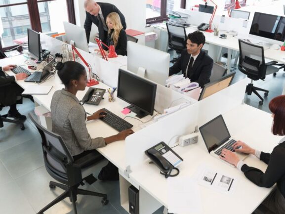 People working at computers in a modern office