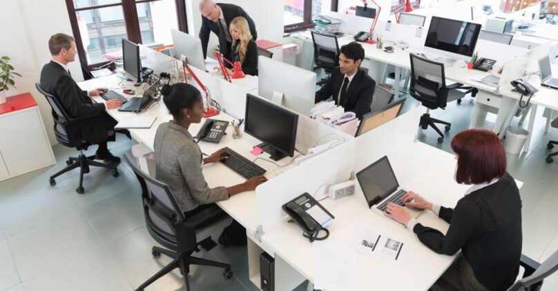 People working at computers in a modern office
