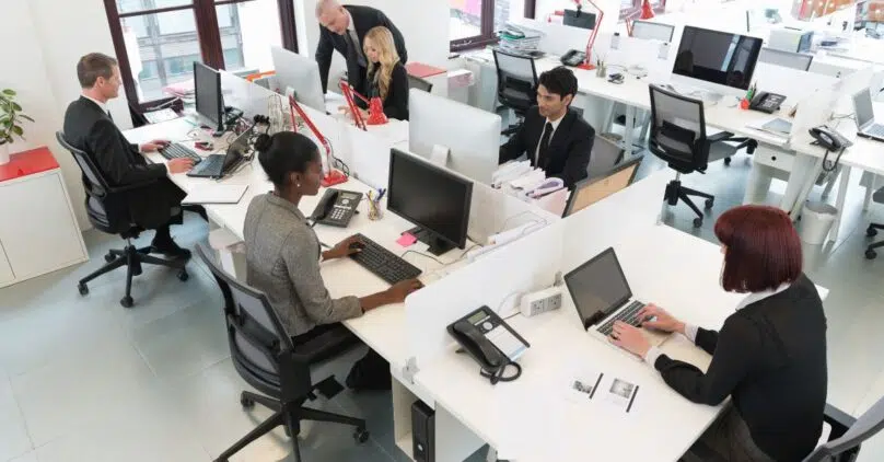 People working at computers in a modern office